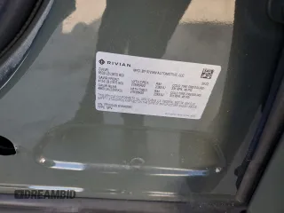 2022 Rivian R1S Launch Edition z VIN 7PDSGABL6NN000590, wystawiony jako Copart lot #61510904 z przebiegiem Nie podano mil oraz Szkody całkowita. Historia ofert i sprzedaży dostępna na DreamBid. Obrazek 14.
