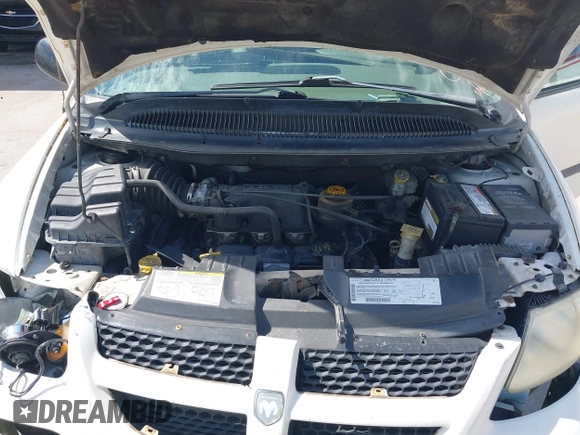 2003 Dodge Grand Caravan with VIN 2D4GP443X3R171373, listed as a IAAI auction lot 41645178 with 163,358 mi miles and . Bid and sale history available at DreamBid. Image 10.