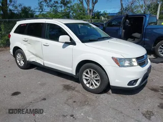 2015 Dodge Journey SXT with VIN 3C4PDCBG4FT727376, listed as a IAAI auction lot 42029881 with 151,042 mi miles. Bid and sale history available at carsss.com. Image 1.