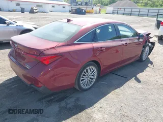 2021 Toyota Avalon Limited Hybrid z VIN 4T1DA1AB2MU008826, wystawiony jako IAAI lot #42220271 z przebiegiem 53 938 mil mil oraz . Historia ofert i sprzedaży dostępna na DreamBid. Obrazek 4.