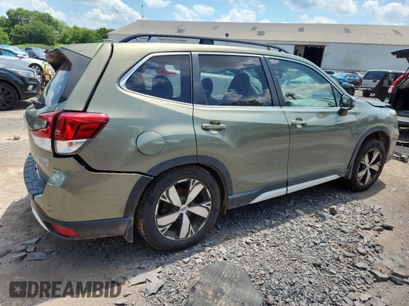 2020 Subaru Forester Touring with VIN JF2SKAXC4LH482519, listed as a Copart auction lot 62868255 with 71,009 mi miles and Salvage title. Bid and sale history available at DreamBid. Image 3.