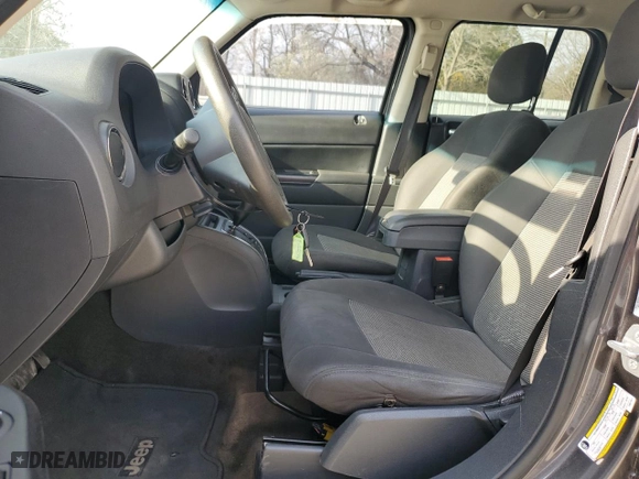 2015 Jeep Patriot Sport with VIN 1C4NJPBB7FD317933, listed as a Copart auction lot 48872985 with 199,293 mi miles and Salvage Title. Bid and sale history available at carsss.com. Image 7.