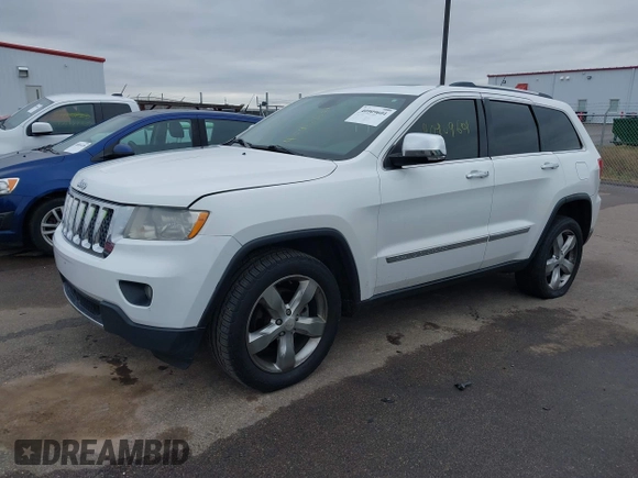 2013 Jeep Grand Cherokee Overland with VIN 1C4RJECG3DC620873, listed as a IAAI auction lot 40909601 with 195,374 mi miles. Bid and sale history available at carsss.com. Image 17.