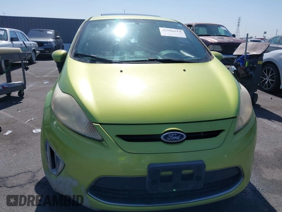 2011 Ford Fiesta SE z VIN 3FADP4EJ5BM138077, wystawiony jako IAAI lot #42506611 z przebiegiem Nie podano mil oraz . Historia ofert i sprzedaży dostępna na DreamBid. Obrazek 6.