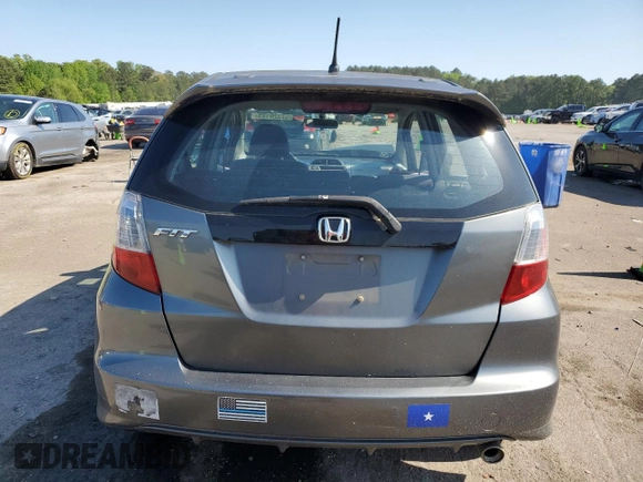2011 Honda Fit Sport z VIN JHMGE8H5XBC002174, wystawiony jako Copart lot #52220125 z przebiegiem 161 816 mil mil oraz Szkody całkowita. Historia ofert i sprzedaży dostępna na DreamBid. Obrazek 6.