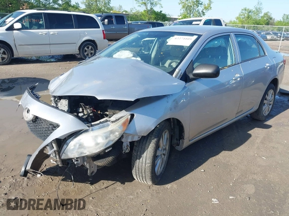 2010 Toyota Corolla z VIN 1NXBU4EE6AZ294311, wystawiony jako IAAI lot #42274105 z przebiegiem Nie podano mil oraz . Historia ofert i sprzedaży dostępna na DreamBid. Obrazek 18.