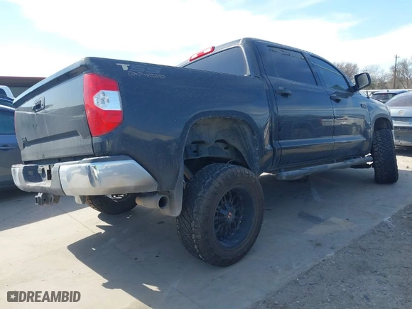 2018 Toyota Tundra 4WD SR5 with VIN 5TFDW5F12JX694518, listed as a IAAI auction lot 41663831 with 183,220 mi miles. Bid and sale history available at carsss.com. Image 4.