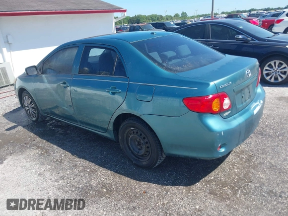 2009 Toyota Corolla with VIN JTDBL40EX99034801, listed as a IAAI auction lot 41943591 with 204,674 mi miles. Bid and sale history available at carsss.com. Image 3.