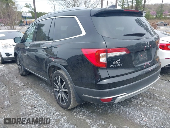 2019 Honda Pilot Touring 7-Passenger z VIN 5FNYF5H66KB027960, wystawiony jako IAAI lot #41863212 z przebiegiem 114 615 mil mil oraz . Historia ofert i sprzedaży dostępna na DreamBid. Obrazek 3.