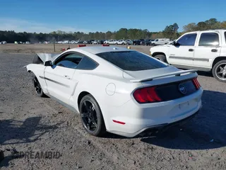 2019 Ford Mustang GT with VIN 1FA6P8CFXK5203249, listed as a IAAI auction lot 41863569 with 86,716 mi miles. Bid and sale history available at carsss.com. Image 3.