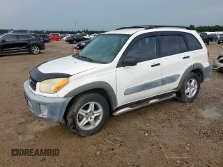 2001 Toyota RAV4 z VIN JTEGH20V010031793, wystawiony jako Copart lot #61197735 z przebiegiem 156 459 mil mil oraz Czysty tytuł • Clean title. Historia ofert i sprzedaży dostępna na DreamBid. Obrazek 1.