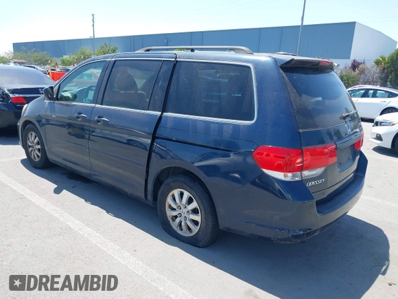 2009 Honda Odyssey EX-L with VIN 5FNRL386X9B409419, listed as a IAAI auction lot 42177197 with 190,827 mi miles. Bid and sale history available at carsss.com. Image 3.