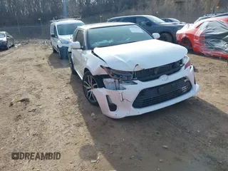 2016 Scion tC with VIN JTKJF5C73GJ014254, listed as a IAAI auction lot 41751320 with 104,247 mi miles. Bid and sale history available at carsss.com. Image 1.