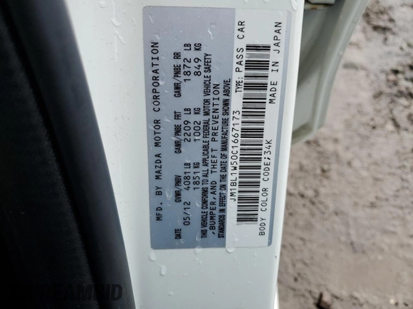 2012 Mazda 3 S Grand Touring with VIN JM1BL1W50C1667173, listed as a Copart auction lot 82194964 with 99,509 mi miles and Salvage Title. Bid and sale history available at DreamBid. Image 13.