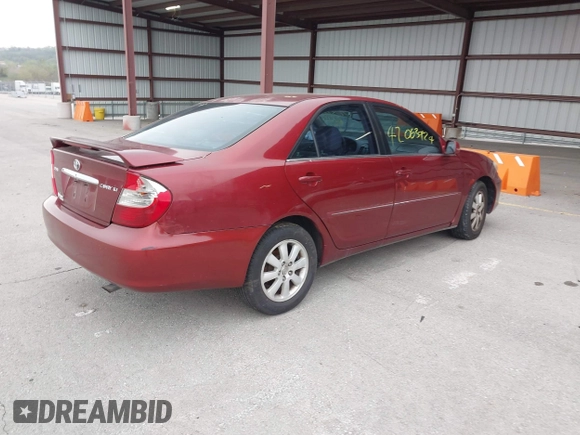 2003 Toyota Camry LE with VIN 4T1BE30K03U227243, listed as a IAAI auction lot 42063924 with 177,323 mi miles and . Bid and sale history available at DreamBid. Image 4.