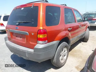 2006 Ford Escape XLT z VIN 1FMCU93126KD09603, wystawiony jako IAAI lot #42401991 z przebiegiem 124 167 mil mil oraz . Historia ofert i sprzedaży dostępna na DreamBid. Obrazek 4.