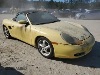 1998 Porsche Boxster z VIN WP0CA2982WU623104, wystawiony jako Copart lot #83398714 z przebiegiem Nie podano mil oraz Czysty tytuł • Clean title. Historia ofert i sprzedaży dostępna na DreamBid. Obrazek 4.