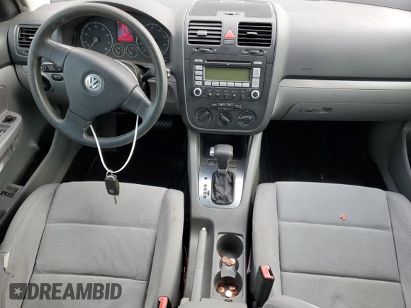 2008 Volkswagen Rabbit S with VIN WVWDB71K58W209036, listed as a Copart auction lot 75685864 with 221,175 mi miles and Salvage title. Bid and sale history available at DreamBid. Image 8.