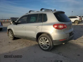 2011 Volkswagen Tiguan SEL w/Premium Navi with VIN WVGAV7AX8BW542758, listed as a Copart auction lot 49356485 with 77,958 mi miles and Salvage Title. Bid and sale history available at DreamBid. Image 2.