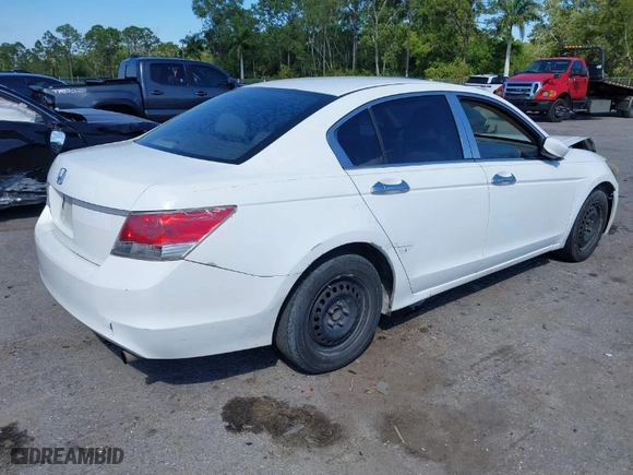 2009 Honda Accord Sdn LX with VIN 1HGCP26309A144565, listed as a IAAI auction lot 41790315 with 233,186 mi miles. Bid and sale history available at carsss.com. Image 4.
