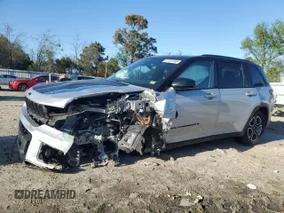 2022 Jeep Grand Cherokee Trailhawk with VIN 1C4RJYC62N8715910, listed as a Copart auction lot 52332265 with 21,976 mi miles and Salvage title. Bid and sale history available at DreamBid. Image 1.
