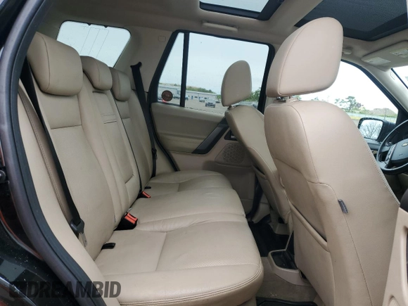 2010 Land Rover LR2 HSE with VIN SALFR2BNXAH195394, listed as a Copart auction lot 58481695 with 143,218 mi miles and Salvage title. Bid and sale history available at DreamBid. Image 11.