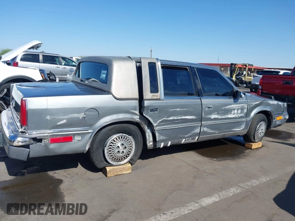 1991 Chrysler New Yorker z VIN 1C3XY66R2MD228813, wystawiony jako IAAI lot #42257734 z przebiegiem 45 786 mil mil oraz . Historia ofert i sprzedaży dostępna na DreamBid. Obrazek 6.