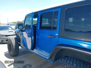 2016 Jeep Wrangler Unlimited Sport with VIN 1C4BJWDG2GL296485, listed as a IAAI auction lot 42177026 with 113,971 mi miles and . Bid and sale history available at DreamBid. Image 14.