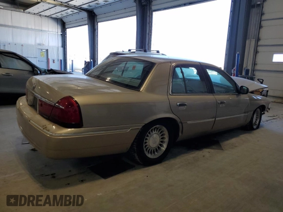 2000 Mercury Grand Marquis LS z VIN 2MEFM75W9YX660599, wystawiony jako Copart lot #52620225 z przebiegiem 88 726 mil mil oraz Szkoda całkowita • Salvage title. Historia ofert i sprzedaży dostępna na DreamBid. Obrazek 3.