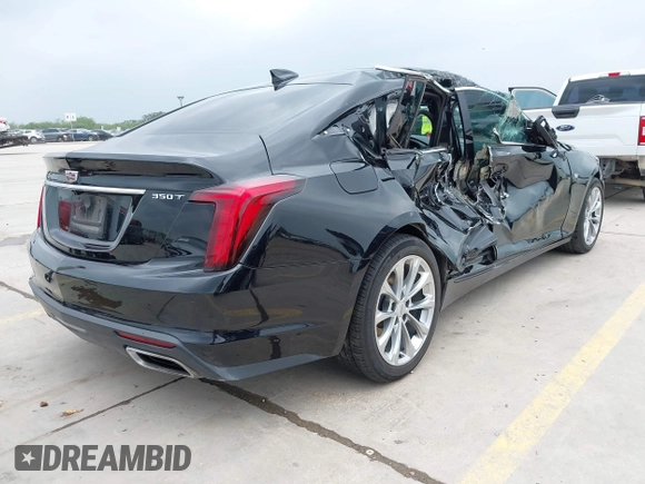 2023 Cadillac CT5 Premium Luxury z VIN 1G6DN5RK7P0119990, wystawiony jako IAAI lot #42293014 z przebiegiem 44 690 mil mil oraz . Historia ofert i sprzedaży dostępna na DreamBid. Obrazek 4.