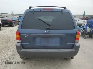 2001 Ford Escape XLT with VIN 1FMYU03131KF10968, listed as a Copart auction lot 67849474 with 197,328 mi miles and Salvage Title. Bid and sale history available at carsss.com. Image 6.