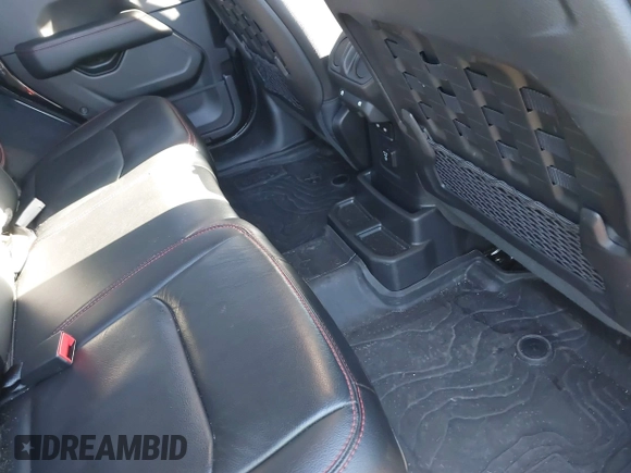 2023 Jeep Wrangler Rubicon with VIN 1C4JJXFGXPW682231, listed as a IAAI auction lot 41110264 with 15,147 mi miles and . Bid and sale history available at DreamBid. Image 8.