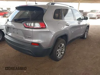 2019 Jeep Cherokee Latitude Plus with VIN 1C4PJLLB9KD109711, listed as a IAAI auction lot 41917339 with 115,320 mi miles. Bid and sale history available at carsss.com. Image 4.