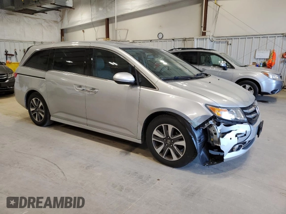 2014 Honda Odyssey Touring with VIN 5FNRL5H97EB005977, listed as a Copart auction lot 53849025 with 229,915 mi miles and Non Repairable. Bid and sale history available at DreamBid. Image 4.