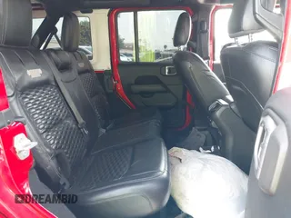 2019 Jeep Wrangler Unlimited Sahara with VIN 1C4HJXEN0KW552028, listed as a IAAI auction lot 41934634 with 53,054 mi miles and . Bid and sale history available at DreamBid. Image 8.
