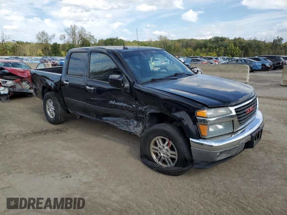2011 GMC Canyon SLE1 with VIN 1GTH6MFE8B8102114, listed as a Copart auction lot 74137234 with 150,598 mi miles and Salvage title. Bid and sale history available at DreamBid. Image 4.