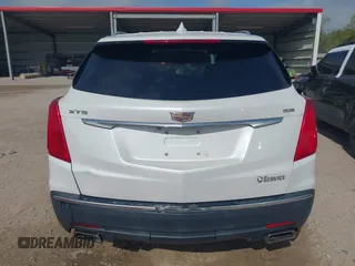 2017 Cadillac XT5 FWD with VIN 1GYKNARS0HZ107734, listed as a IAAI auction lot 41882031 with 89,397 mi miles. Bid and sale history available at carsss.com. Image 17.