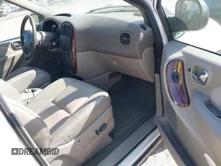 2003 Chrysler Town & Country Limited with VIN 2C8GP64L13R205501, listed as a IAAI auction lot 42131935 with 158,009 mi miles. Bid and sale history available at carsss.com. Image 5.