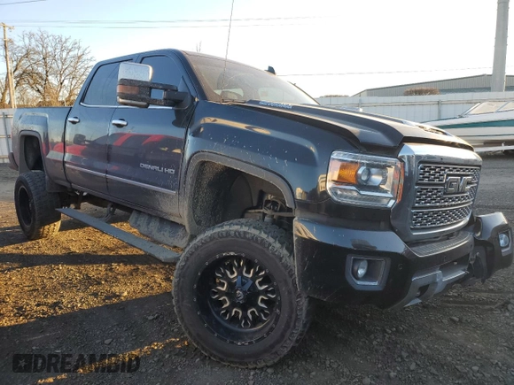 2019 GMC Sierra 2500HD Denali with VIN 1GT12SEY8KF148275, listed as a Copart auction lot 42408315 with 41,216 mi miles and Salvage Title. Bid and sale history available at carsss.com. Image 4.