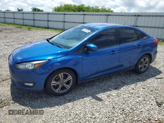 2018 Ford Focus SE z VIN 1FADP3FE2JL293021, wystawiony jako Copart lot #56907095 z przebiegiem 162 116 mil mil oraz Szkoda całkowita • Salvage title. Historia ofert i sprzedaży dostępna na DreamBid. Obrazek 1.