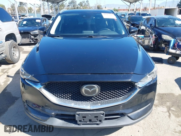 2019 Mazda CX-5 Sport with VIN JM3KFABM7K1579747, listed as a IAAI auction lot 41965097 with 151,042 mi miles and . Bid and sale history available at DreamBid. Image 13.