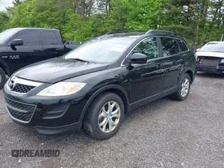 2011 Mazda CX-9 Touring z VIN JM3TB3CV6B0324256, wystawiony jako IAAI lot #42245746 z przebiegiem 128 420 mil mil oraz . Historia ofert i sprzedaży dostępna na DreamBid. Obrazek 2.
