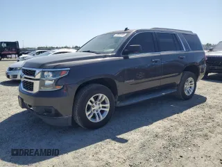 2015 Chevrolet Tahoe LT with VIN 1GNSCBKC8FR246289, listed as a Copart auction lot 52630185 with 102,331 mi miles and Salvage Title. Bid and sale history available at DreamBid. Image 1.