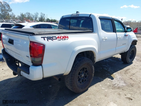 2019 Toyota Tacoma 4WD SR with VIN 3TMCZ5AN3KM207007, listed as a IAAI auction lot 41755529 with 43,203 mi miles. Bid and sale history available at carsss.com. Image 4.