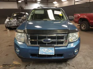 2009 Ford Escape XLT with VIN 1FMCU93G99KB70918, listed as a IAAI auction lot 41942399 with 141,158 mi miles. Bid and sale history available at carsss.com. Image 12.