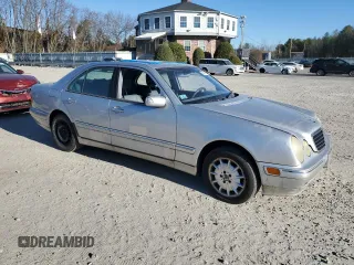 2001 Mercedes-Benz E-Class AWD with VIN WDBJF82J81X059893, listed as a Copart auction lot 80285554 with 156,713 mi miles and Clean Title. Bid and sale history available at carsss.com. Image 4.
