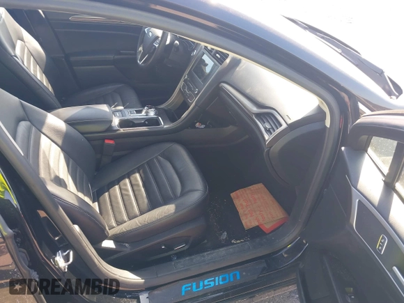 2018 Ford Fusion Energi SE with VIN 3FA6P0PU8JR152890, listed as a IAAI auction lot 41682965 with 84,890 mi miles. Bid and sale history available at carsss.com. Image 5.