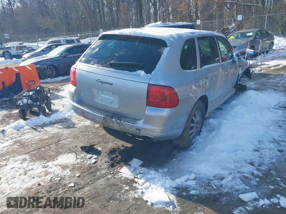 2005 Porsche Cayenne with VIN WP1AA29P75LA22059, listed as a IAAI auction lot 41250250 with 124,835 mi miles. Bid and sale history available at carsss.com. Image 4.