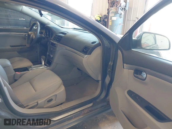 2007 Saturn Aura XE z VIN 1G8ZS57NX7F113634, wystawiony jako IAAI lot #42220503 z przebiegiem 102 611 mil mil oraz . Historia ofert i sprzedaży dostępna na DreamBid. Obrazek 5.