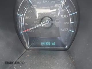 2012 Ford Taurus SEL with VIN 1FAHP2EW8CG113879, listed as a IAAI auction lot 42004495 with 194,952 mi miles and . Bid and sale history available at DreamBid. Image 7.